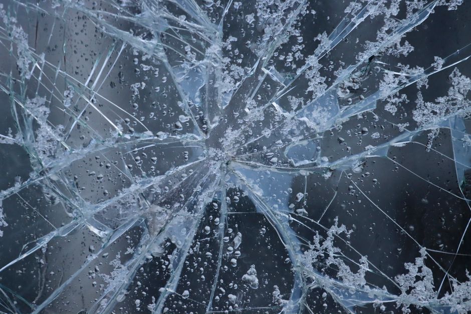 Severely cracked windshield requiring a full auto glass replacement